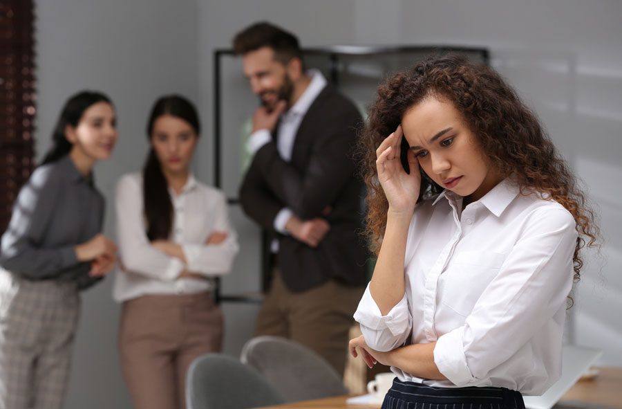 darker-skinned-businesswoman-experiencing-discrimination-at-work