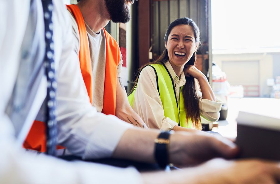 factory-workers-laughing-during-break