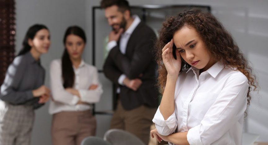 darker-skinned-businesswoman-experiencing-discrimination-at-work